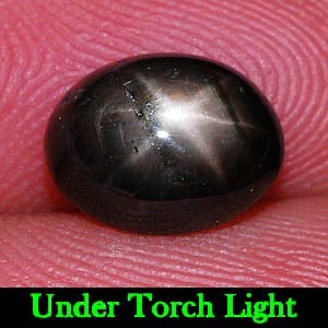 Natural Black Star Sapphire 6 Rays 2.68 Ct. Oval Cabochon Shape 9.1 x 7.1 Mm Gemstone From Thailand: Product ID: 806132798 Product Name: Natural Star Sapphire Weight: 2.68 CT. Size: 9.1 x 7.1 x 3.8 MM. Shape: Oval Cabochon Color: Black Clarity:Opaque Luster: Good 6 Rays Star Gems Origin: Thailand Tre