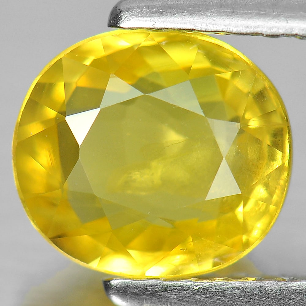 Natural Yellow Sapphire 1.58 Ct. Oval Shape 7.4 x 6.6 Mm Gemstone From Thailand (1 of 3)