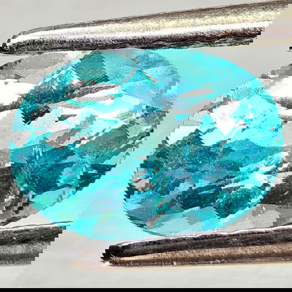 Natural Paraiba Color Apatite 0.90 Ct. Oval Shape 7.2 x 5.1 Mm Gemstones From Tanzania: Product ID: 800613718 Product Name: Natural Apatite Weight: 0.90 CT. Size: 7.2 x 5.1 x 3.7 MM. Shape: Oval Color: Neon Blue Clarity:VSI Luster: Good Gems Origin: Tanzania Treatment: Unheated Crystal S