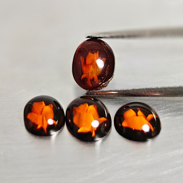 Natural Amber 1.75 Ct. 4 Pcs. Flower Carving In Oval Cabochon Shape 8.4 x 6.6 Mm Gemstones From: Product ID: 819091011 Product Name: Natural Amber Weight: 1.75 CT. Size: 8.4 x 6.6 x 3.5 MM. Shape: Oval Cabochon Color: Brown Yellow Clarity:Semi - Transparent Luster: Good Gems Origin: Poland Treatm