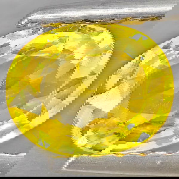 Natural Yellow Sapphire 0.71 Ct. Oval Shape 6.1 x 4.9 Mm Gemstone from Thailand: Product ID: 806162840 Product Name: Natural White Gold Weight: 0.71 CT. Size: 6.1 x 4.9 x 2.7 MM. Shape: Oval Shape Color: Yellow Clarity:VSI Luster: Good Gems Origin: Thailand Treatment: Heated Cryst