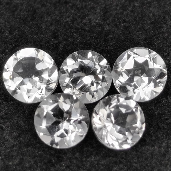 Natural White Topaz 4.99 Ct. 5 Pcs Round Shape 6.2 Mm Gemstone from Brazil: Product ID: 807168803 Product Name: Natural Topaz Weight: 4.99 CT. Size: 6.2 x 6.2 x 4.4 MM. Shape: Round Color: White Clarity:VSI Luster: Good Gems Origin: Brazil Treatment: Unheated Crystal Structur