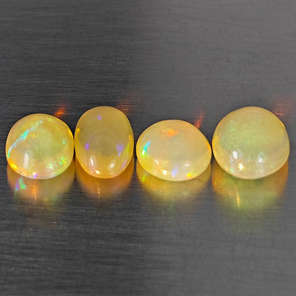 Natural Multi Color Opal 2.23 Ct. 4 Pcs Oval Cabochon Shape 6.3 x 5.2 Mm Gemstones From Ethiopia: Product ID: 818728411 Product Name: Natural Opal Weight: 2.23 CT. Size: 6.3 x 5.2 x 3.8 MM. Shape: Oval Cabochon Color: Multi-Color Clarity:Semi - Transparent Luster: Good Gems Origin: Ethiopia Treatm