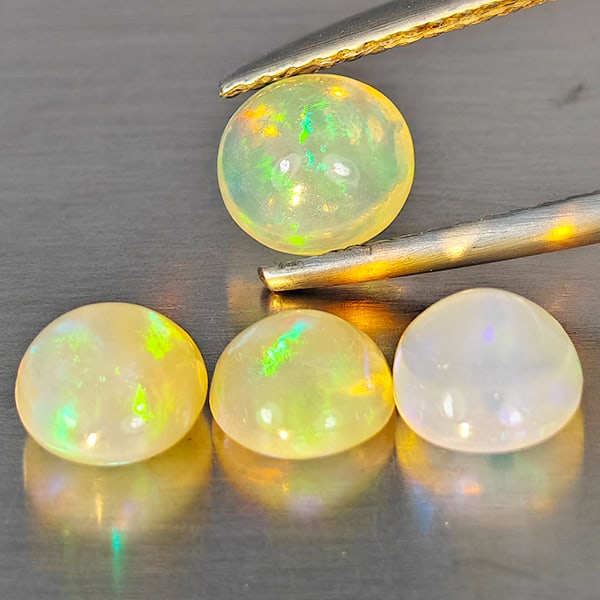 Natural Multi Color Opal 2.37 Ct. 4 Pcs Mixed Cabochon Shape Gemstones From Ethiopia: Product ID: 818728412 Product Name: Natural Opal Weight: 2.37 CT. Size: 6.2 x 5.8 x 3.8 to 5.7 x 5.7 x 3.2 MM. Shape: Mixed Cabochon Color: Multi-Color Clarity:Semi - Transparent Luster: Good Gems Ori