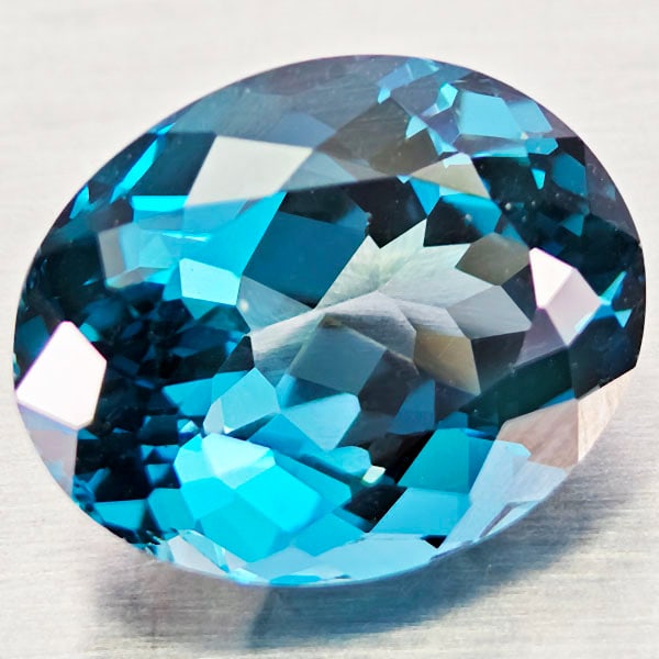 Natural London Blue Topaz 5.03 Ct. VVS Oval Shape 11.1 x 8.9 Mm. Gemstone From Brazil: Product ID: 807168434 Product Name: Natural Blue Topaz Weight: 5.03 CT. Size: 11.1 x 8.9 x 6.7 MM. Shape: Oval Color: London Blue Clarity:VVS Luster: Very Good Gems Origin: Brazil Treatment: Treated C