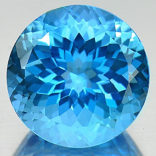 Natural Swiss Blue Topaz 14.93 Ct. Clean Round Shape 15 Mm. Gemstone From Brazil: Product ID: 807166754 Product Name: Natural Blue Topaz Weight: 14.93 CT. Size: 15 x 15 x 10 MM. Shape: Round Color: Blue Clarity:IF Luster: Very Good Gems Origin: Brazil Treatment: Treated Crystal Str