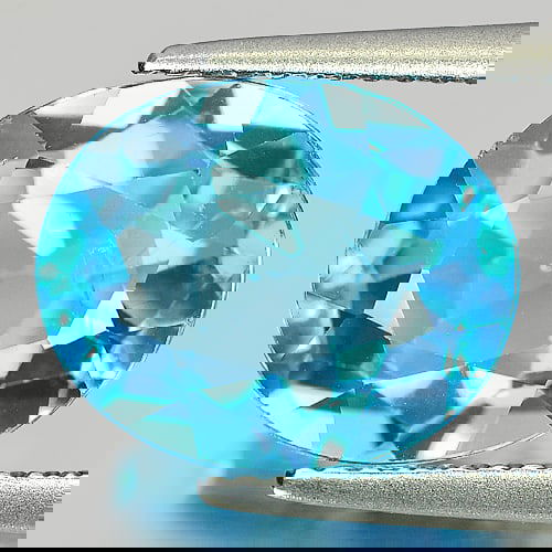 Natural Swiss Blue Topaz 6.19 Ct. Oval Shape 12 x 10 Mm Gemstone From Brazil (1 of 3)