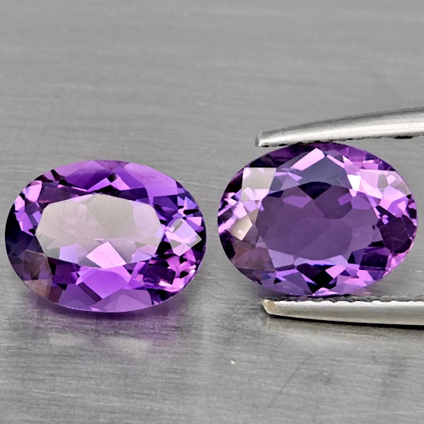 Natural Purple Amethyst 4.56 Ct. 2 Pcs VVS Oval Shape 10.1 x 7.9 Mm Gemstone From Brazil: Product ID: 800325612 Product Name: Natural Amethyst Weight: 4.56 CT. Size: 10.1 x 7.9 x 5.6 MM. Shape: Oval Color: Purple Clarity:VVS Luster: Good Gems Origin: Brazil Treatment: Unheated Crystal Stru