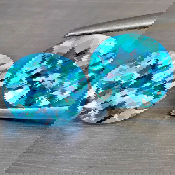 Natural Swiss Blue Topaz 2.51 Ct. 2 Pcs. VVS Oval Shape 7.3 x 6.1 Mm Gemstone from Brazil: Product ID: 807169064 Product Name: Natural Blue Topaz Weight: 2.51 CT. Size: 7.3 x 6.1 x 4.2 MM. Shape: Oval Shape Color: Swiss Blue Clarity:VVS Luster: Good Gems Origin: Brazil Treatment: Treated Cr
