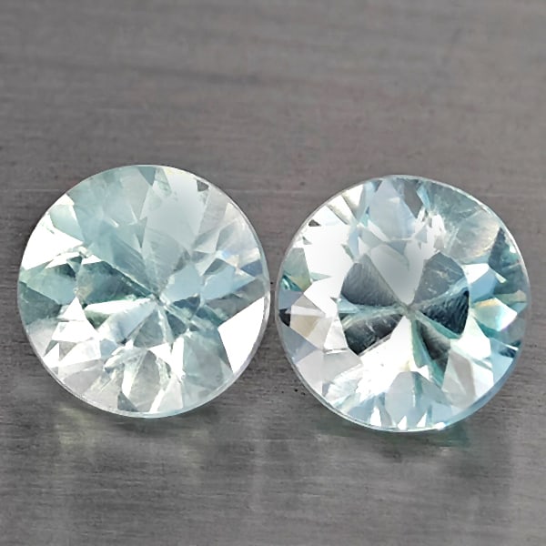 Natural Blue Zircon 1.34 Ct. 2 Pcs Round Diamond Cut 4.8 Mm Gemstone From Cambodia: Product ID: 807743231 Product Name: Natural Zircon Weight: 1.34 CT. Size: 4.8 x 4.8 x 3.3 MM. Shape: Round Diamond Cut Color: Blue Clarity:SI1 Luster: Good Gems Origin: Cambodia Treatment: Heated Crys