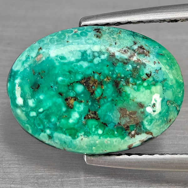 Natural Multi Color Green Turquoise 3.65 Ct. Oval Shape Cabochon 14 x 10.2 Mm Gemstone from india: Product ID: 809100016 Product Name: Natural Gemstones Weight: 3.65 CT. Size: 14 x 10.2 x 3.5 MM. Shape: Oval Cabochon Shape Color: Multi Color Green Clarity:Opaque Luster: Good Gems Origin: India Trea