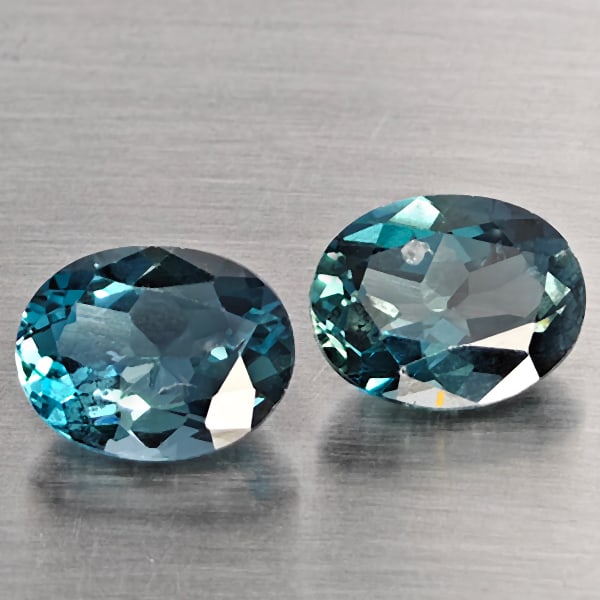 Natural London Blue Topaz 4.49 Ct. 2 Pcs Oval Shape 9.1 x 7.2 Mm Gemstone from Brazil: Product ID: 807168960 Product Name: Natural Blue Topaz Weight: 4.49 CT. Size: 9.1 x 7.2 x 4.8 MM. Shape: Oval Color: London Blue Clarity:VSI Luster: Good Gems Origin: Brazil Treatment: Treated Crystal