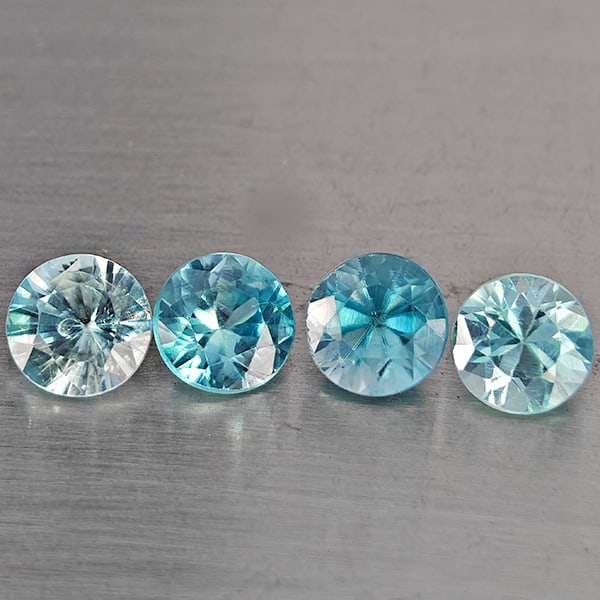 Natural Blue Zircon 2.68 Ct. 4 Pcs Round Diamond Cut Gemstone From Cambodia: Product ID: 807743245 Product Name: Natural Zircon Weight: 2.68 CT. Size: 5 x 5 x 4 to 4.8 x 4.8 x 3.6 MM. Shape: Round Diamond Cut Color: Blue Clarity:SI1 Luster: Good Gems Origin: Cambodia Treatment