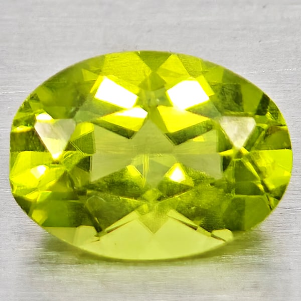 Natural Green Peridot 0.73 Ct. Oval Shape 6.8 x 5.1 Mm Gemstone from Pakistan (1 of 3)