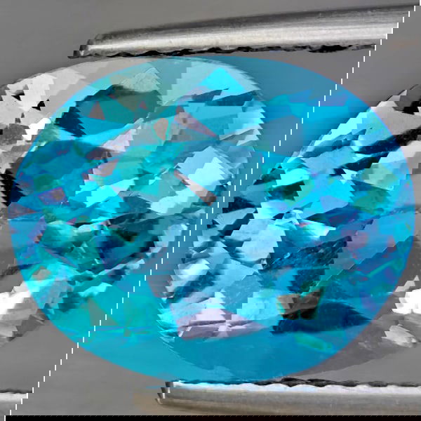 Natural Swiss Blue Topaz 5.86 Ct. Oval Shape 12.1 x 9.8 Mm Gemstone from Brazil (1 of 3)