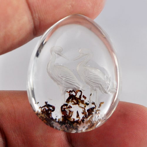 Natural Moss Quartz 100.00 Ct. Birds Carving Inner Pear Cabochon Shape Gemstone: Product ID: 805527009 Product Name: Natural Quartz Weight: 100.00 CT. Size: 32 x 26 x 18 MM. Shape: Pear Cabochon Color: White Clarity:Semi - Transparent Luster: Good Gems Origin: Thailand Treatment: