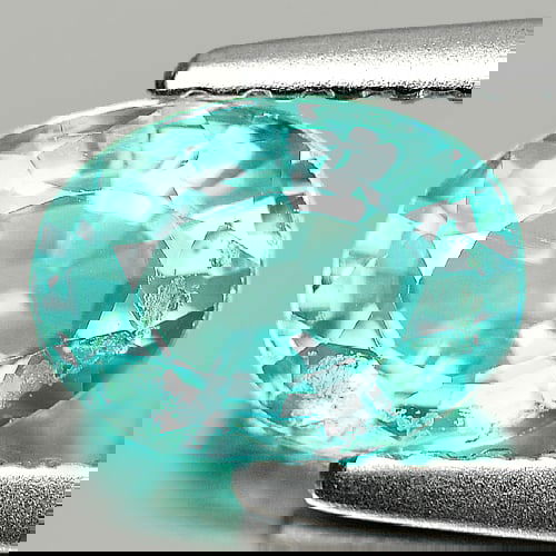 Natural Paraiba Color Apatite 0.84 Ct. Oval Shape 6.9 x 5.2 Mm Gemstone from Tanzania: Product ID: 800604039 Product Name: Natural Apatite Weight: 0.84 CT. Size: 6.9 x 5.2 x 3.4 MM. Shape: Oval Color: Neon Blue Clarity:SI Luster: Good Gems Origin: Tanzania Treatment: Unheated Crystal St