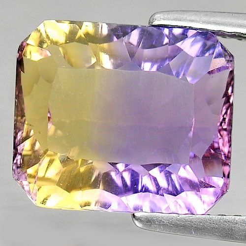 Natural Bi Color Ametrine 5.53 Ct. Clean Octagon Millennium Cut 11.7 x 10 Mm. Gemstone From Bolivia: Product ID: 800408009 Product Name: Natural Ametrine Weight: 5.53 CT. Size: 11.7 x 10 x 6 MM. Shape: Octagon Millennium Cut Color: Bi Color Clarity:IF Luster: Very Good Gems Origin: Bolivia Treatment: