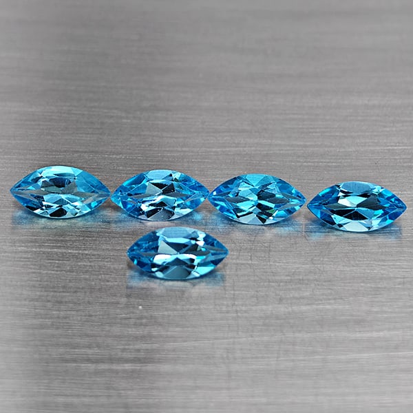 Natural Swiss Blue Topaz 6.13 Ct. 5 Pcs Marquise Shape 10 x 5.2 Mm Gemstone From Brazil: Product ID: 807168706 Product Name: Natural Blue Topaz Weight: 6.13 CT. Size: 10 x 5.2 x 3.8 MM. Shape: Marquise Shape Color: Swiss Blue Clarity:VSI Luster: Good Gems Origin: Brazil Treatment: Treated
