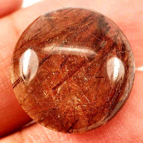 Natural White Brown Rutilated Quartz 20.90 Ct. Round Shape 18.5 Mm Gemstone from Thailand: Product ID: 805524079 Product Name: Natural Quartz Weight: 20.90 CT. Size: 18.5 x 18.5 x 8.3 MM. Shape: Round Cabochon Color: White Brown Clarity:Semi - Transparent Luster: Good Gems Origin: Thailand