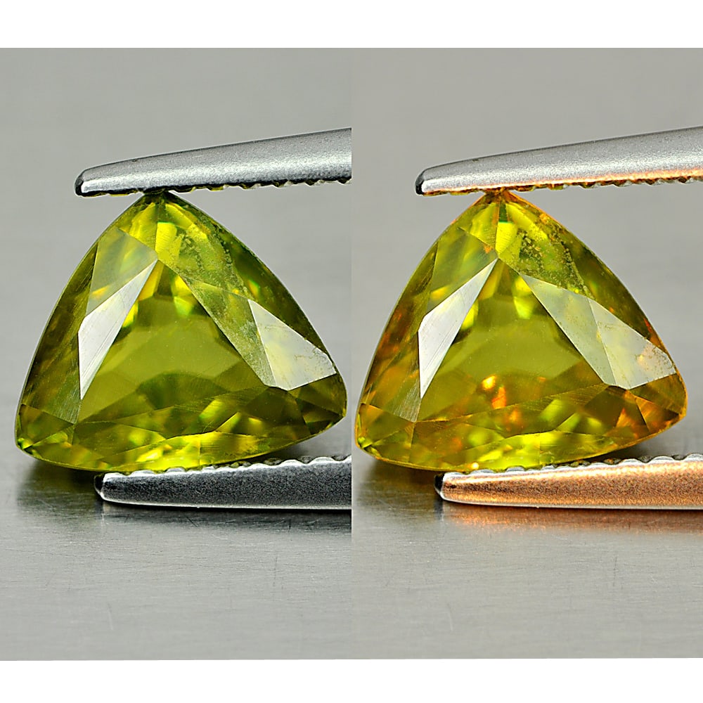 Natural Multi Color Sphene With Rainbow Spark 1.76 Ct. Trilliant Shape 8.7 x 7.3 Mm. Gemstone: Product ID: 806507779 Product Name: Natural Sphene Weight: 1.76 CT. Size: 8.7 x 7.3 x 4 MM. Shape: Trilliant Color: Yellow Clarity:VSI Luster: Adamantine Gems Origin: Madagascar Treatment: Unheated Cr