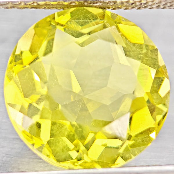 Natural Yellow Lemon Quartz 4.74 Ct. Round Shape 11.1 Mm Gemstone From Brazil: Product ID: 805530118 Product Name: Natural Quartz Weight: 4.74 CT. Size: 11.1 x 11.1 x 6.8 MM. Shape: Round Color: Yellow Lemon Clarity:VSI Luster: Good Gems Origin: Brazil Treatment: Unheated Crysta