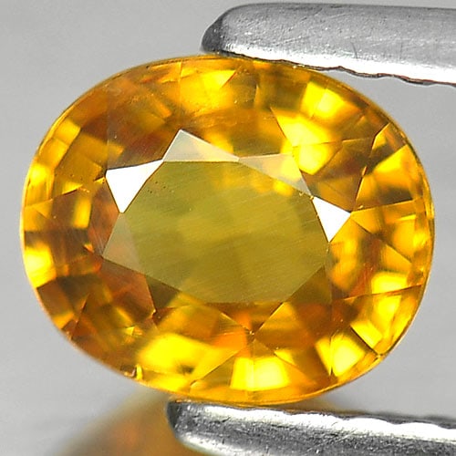 Natural Yellow Sapphire 1.19 Ct. VS Oval Shape 6.7 x 5.7 Mm. Gemstone From Thailand: Product ID: 806142659 Product Name: Natural Yellow Sapphire Weight: 1.19 CT. Size: 6.7 x 5.7 x 3.5 MM. Shape: Oval Color: Yellow Clarity:VS Luster: Very Good Gems Origin: Thailand Treatment: Heated Cr