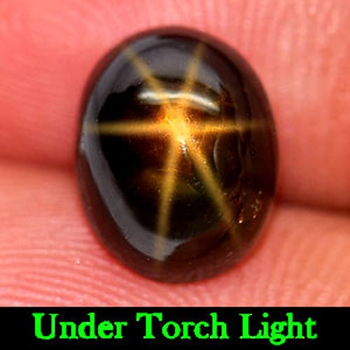 Certified Natural Golden Star Sapphire 6 Rays 4.73 Ct. Oval Cabochon Shape 7.68 x 9.71 Mm Gemstone: Product ID: 806149955 Product Name: Natural Star Sapphire Weight: 4.73 CT. Size: 7.68 x 9.71 x 5.41 MM. Shape: Oval Cabochon Color: Yellow Clarity:Opaque Luster: Good 6 Ray Star Gems Origin: Thailand