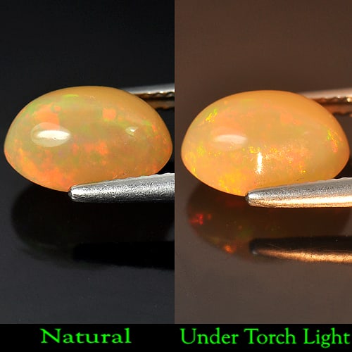 Natural Multi Color Opal 2.59 Ct. Oval Cabochon Shape 11.4 x 7.2 Mm. Unheated Gemstone: Product ID: 818707678 Product Name: Natural Opal Weight: 2.59 CT. Size: 11.4 x 7.2 x 6 MM. Shape: Oval Cabochon Color: Multi Color Clarity:Semi - Transparent Luster: Good Gems Origin: Ethiopia Treatme