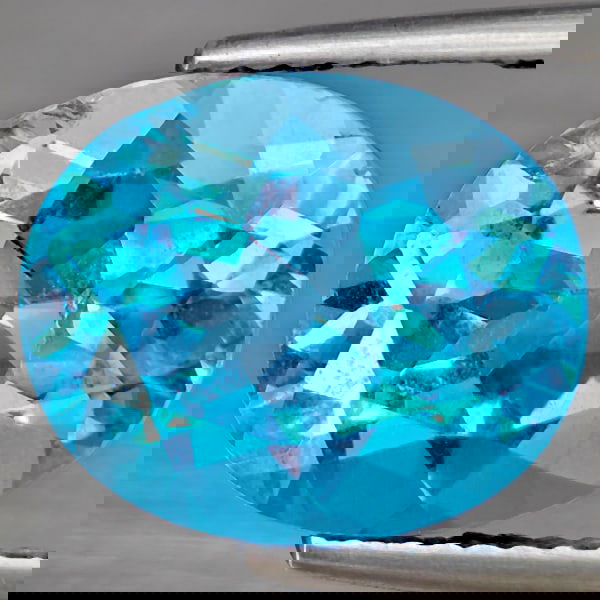 Natural Swiss Blue Topaz 5.92 Ct. Oval Shape 12.3 x 10.3 Mm Gemstone from Brazil: Product ID: 807169012 Product Name: Natural Blue Topaz Weight: 5.92 CT. Size: 12.3 x 10.3 x 6.8 MM. Shape: Oval Shape Color: Swiss Blue Clarity:VSI Luster: Good Gems Origin: Brazil Treatment: Treated