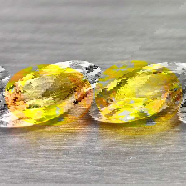 Natural Yellow Fancy Color Songea Sapphire 1.23 Ct. 2 Pcs Oval Shape Gemstones From Tanzania: Product ID: 806162140 Product Name: Natural Blue Sapphire Weight: 1.23 CT. Size: 5 x 4.7 x 2.5 MM. Shape: Oval Color: Yellow Fancy Color Clarity:VSI Luster: Good Gems Origin: Tanzania Treatment: Heate