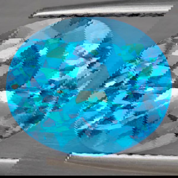 Natural Swiss Blue Topaz 6.28 Ct. Oval Shape 12 x 10.2 Mm Gemstone from Brazil: Product ID: 807169020 Product Name: Natural Blue Topaz Weight: 6.28 CT. Size: 12 x 10.2 x 7.2 MM. Shape: Oval Shape Color: Swiss Blue Clarity:VSI Luster: Good Gems Origin: Brazil Treatment: Treated Cr