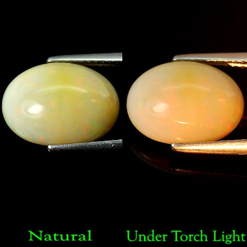 Natural Multi Color Opal 4.20 Ct. Oval Cabochon Shape 14 x 10 Mm Gemstone From Ethiopia: Product ID: 818708475 Product Name: Natural Opal Weight: 4.20 CT. Size: 14 x 10.5 x 5.8 MM. Shape: Oval Cabochon Color: Multi Color Clarity:Semi - Transparent Luster: Good Gems Origin: Ethiopia Treatm