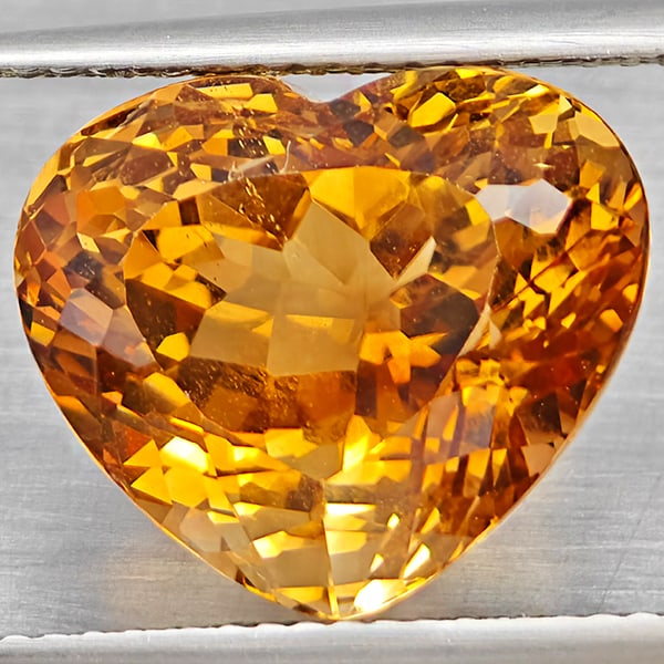 Natural Imperial Topaz 13.35 Ct. Heart Shape 14 x 12 Mm. Gemstone From Brazil: Product ID: 807168579 Product Name: Natural Topaz Weight: 13.35 CT. Size: 14 x 12 x 10.6 MM. Shape: Heart Shape Color: Imperial Clarity:VSI Luster: Very Good Gems Origin: Brazil Treatment: Treated Cry