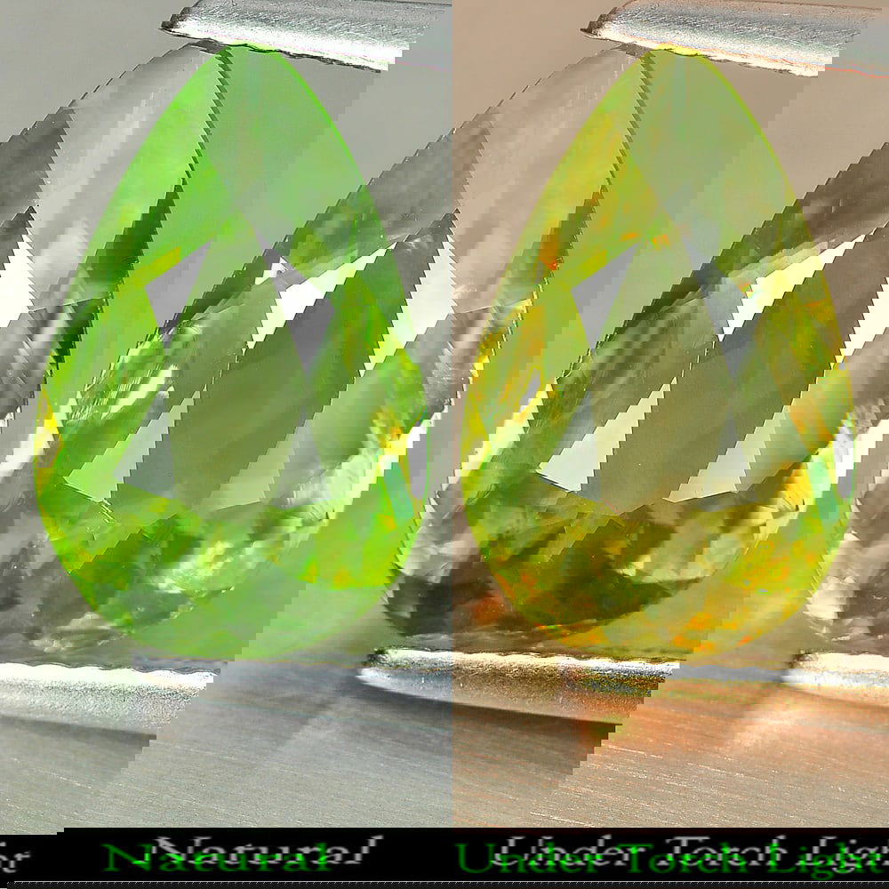Natural Greenish Yellow Titanium Sphene Rainbow Spark 2.79 Ct. Pear Shape 13.3 x 8.4 Mm. Gemstone (1 of 3)