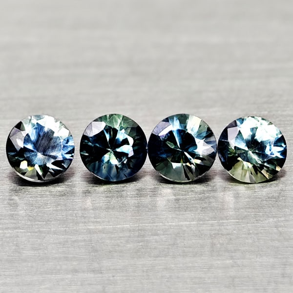 Natural Fancy Color Sapphire 0.69 Ct. 4 Pcs Round Diamand Cut 3.3 Mm Gemstones From Tanzania: Product ID: 806162167 Product Name: Natural Green Sapphire Weight: 0.69 CT. Size: 3.3 x 3.3 x 2.3 MM. Shape: Round Diamond Cut Color: Fancy Color Clarity:VSI Luster: Very Good Gems Origin: Tanzania Tr
