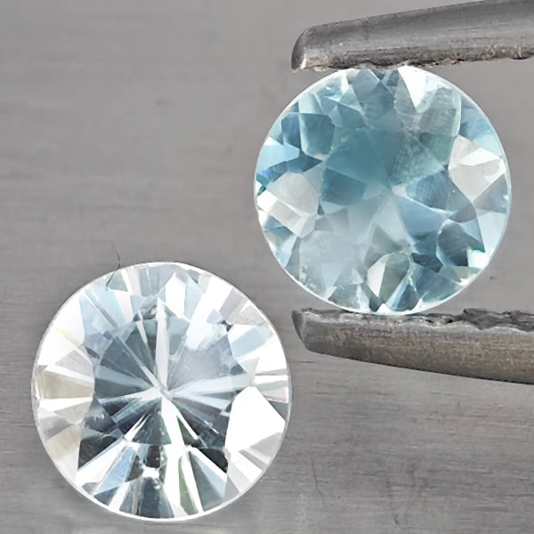 Natural Blue Zircon 1.53 Ct. 2 Pcs Round Diamond Cut 5.3 Mm Gemstone From Cambodia: Product ID: 807743236 Product Name: Natural Zircon Weight: 1.53 CT. Size: 5.3 x 5.3 x 3.9 MM. Shape: Round Diamond Cut Color: Blue Clarity:SI1 Luster: Good Gems Origin: Cambodia Treatment: Heated Crys