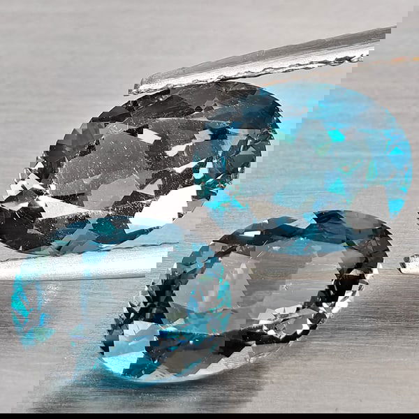 Natural London Blue Topaz 3.99 Ct. 2 Pcs Oval Shape 8.9 x 7.2 Mm Gemstone from Brazil: Product ID: 807168904 Product Name: Natural Blue Topaz Weight: 3.99 CT. Size: 8.9 x 7.2 x 4.5 MM. Shape: Oval Color: London Blue Clarity:SI1 Luster: Good Gems Origin: Brazil Treatment: Treated Crystal