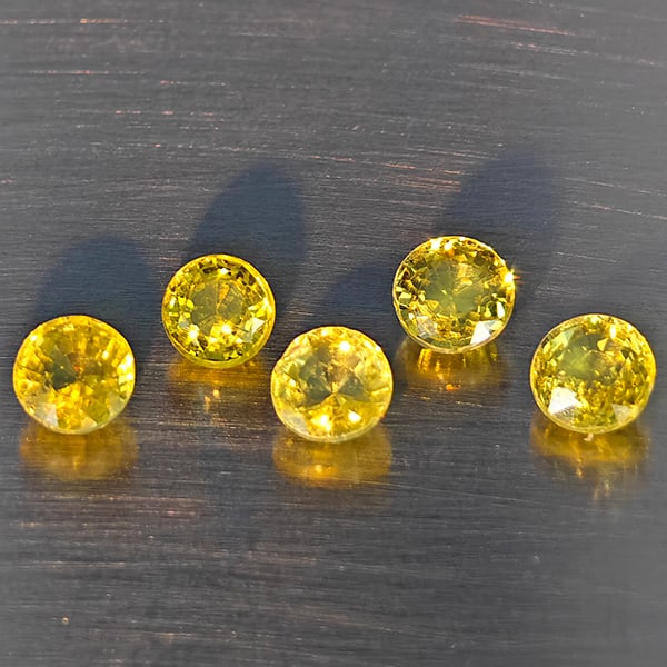 Natural Greenish Yellow Titanium Sphene Rainbow Spark 1.22 Ct. 5 Pcs Round Shape 3.6 Mm Gemstones: Product ID: 806509398 Product Name: Natural Sphene Weight: 1.22 CT. Size: 3.6 x 3.6 x 2.3 MM. Shape: Round Color: Greenish Yellow Clarity:SI1 Luster: Good Gems Origin: Madagascar Treatment: Unheated C