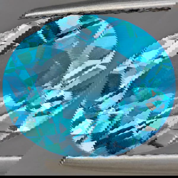Natural Swiss Blue Topaz 4.69 Ct. Oval Shape 12.1 x 10.1 Mm Gemstone from Brazil (1 of 3)