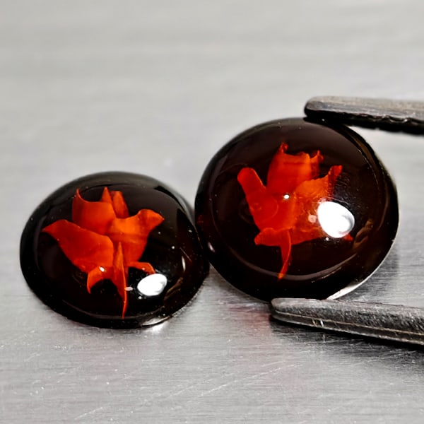 Natural Amber 0.66 Ct. Flower Carving In Oval Cabochon Shape 7.4 x 6.8 Mm Gemstones From Poland: Product ID: 819091034 Product Name: Natural Amber Weight: 0.66 CT. Size: 7.4 x 6.8 x 2.2 MM. Shape: Oval Cabochon Color: Brown Yellow Clarity:Semi - Transparent Luster: Good Gems Origin: Poland Treatm