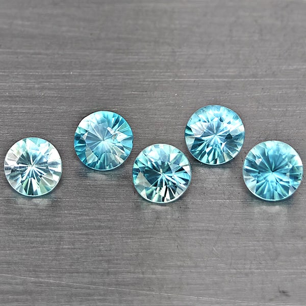 Natural Blue Zircon 1.75 Ct. 5 Pcs Round Diamond Cut 4.3 Mm Gemstone from Cambodia: Product ID: 807743271 Product Name: Natural Gemstones Weight: 1.75 CT. Size: 4.3 x 4.3 x 2.8 MM. Shape: Round Diamond Cut Color: Blue Clarity:SI1 Luster: Good Gems Origin: Cambodia Treatment: Heated C