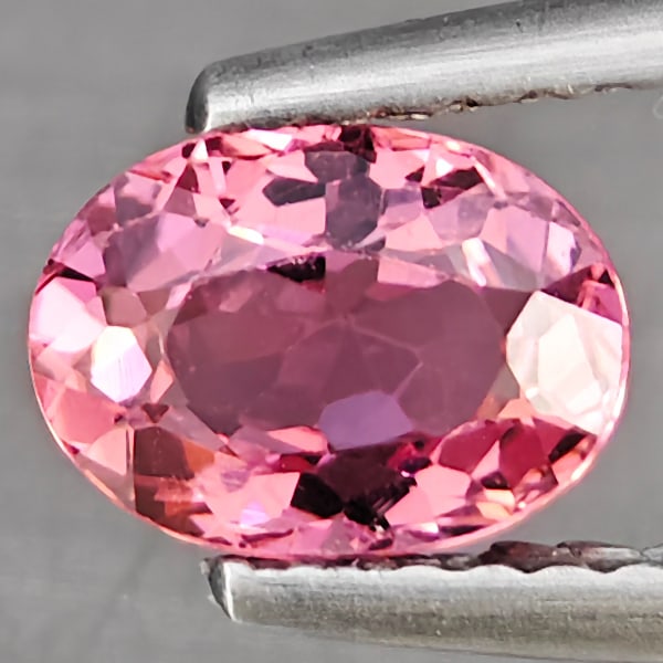 Natural Pink Tourmaline 0.82 Ct. Oval Shape 7 x 5.1 Mm Gemstones From Nigeria: Product ID: 807251529 Product Name: Natural Tourmaline Weight: 0.82 CT. Size: 7 x 5.1 x 3.7 MM. Shape: Oval Shape Color: Pink Clarity:VSI Luster: Good Gems Origin: Nigeria Treatment: Unheated Crystal