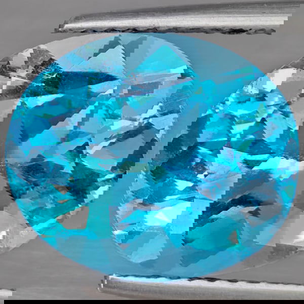 Natural Swiss Blue Topaz 6.20 Ct. Oval Shape 12.1 x 10.1 Mm Gemstone from Brazil: Product ID: 807169015 Product Name: Natural Blue Topaz Weight: 6.20 CT. Size: 12.1 x 101 x 7.2 MM. Shape: Oval Shape Color: Swiss Blue Clarity:VSI Luster: Good Gems Origin: Brazil Treatment: Treated C