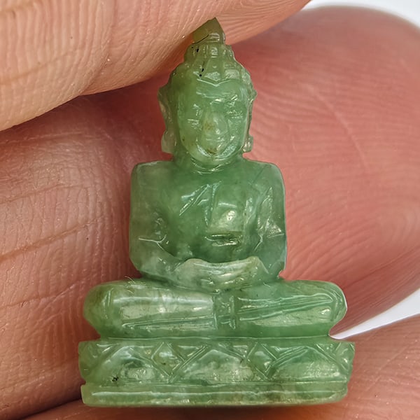Natural Green Jade Buddha Carving 9.94 Ct. Size 19.8 x 13.8 Mm. Gemstone from Thailand: Product ID: 819816182 Product Name: Natural Gemstones Weight: 9.94 CT. Size: 19.8 x 13.8 x 6.7 MM. Shape: Caving Color: Green Clarity:Opaque Luster: Good Gems Origin: Thailand Treatment: Unheated Crys