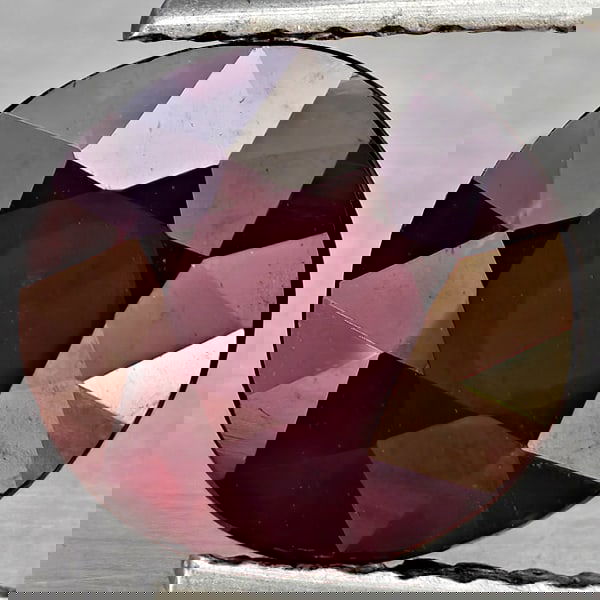 Natural Purplish Red Rhodolite Garnet 2.61 Ct. Oval Shape 8.5 x 8 Mm Gemstone From Madagascar: Product ID: 802937786 Product Name: Natural Rhodolite Weight: 2.61 CT. Size: 8.5 x 8 x 4.9 MM. Shape: Oval Shape Color: Purplish Red Clarity:VSI Luster: Good Gems Origin: Madagascar Treatment: Unheate