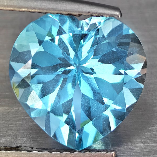 Natural Baby Blue Topaz 2.87 Ct. Heart Shape 11 Mm Gemstone From Brazil: Product ID: 807168769 Product Name: Natural Blue Topaz Weight: 2.87 CT. Size: 11 x 11 x 6.7 MM. Shape: Heart Shape Color: Baby Blue Clarity:VSI Luster: Good Gems Origin: Brazil Treatment: Treated Crys