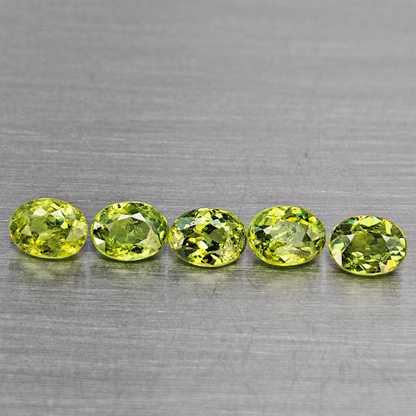 Natural Green Demantiod Garnet 1.36 Ct. 5 Pcs Oval Shape 4.4 x 3.4 Mm Gemstones From Madagascar: Product ID: 802937600 Product Name: Natural Demantoid Weight: 1.36 CT. Size: 4.4 x 3.4 x 2.5 MM. Shape: Oval Shape Color: Green Clarity:SI1 Luster: Good Gems Origin: Madagascar Treatment: Unheated Cry