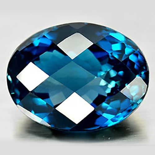 Natural London Blue Topaz 85.04 Ct. Clean Oval Checkerboard Cut 29 x 22 Mm. Gemstone From Brazil: Product ID: 807156425 Product Name: Natural Blue Topaz Weight: 85.04 CT. Size: 29 x 22 x 16.4 MM. Shape: Oval Checkerboard Color: London Blue Clarity:IF Luster: Good Gems Origin: Brazil Treatment: Tre
