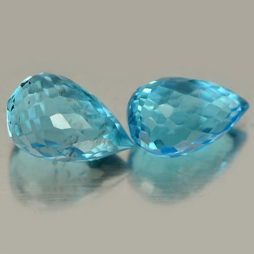Natural Blue Topaz 1.92 Ct. 2 Pcs Briolette Shape 6.7 x 4.3 Mm Gemstone From Brazil: Product ID: 807151222 Product Name: Natural Blue Topaz Weight: 1.92 CT. Size: 6.7 x 4.3 x 4.3 MM. Shape: Briolette Color: Blue Clarity:VSI Luster: Good Gems Origin: Brazil Treatment: Treated Crystal S